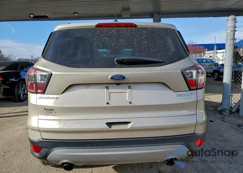 2017 Ford Escape Titanium z USA, uszkodzony, nr VIN 1FMCU0JD6HUB42226